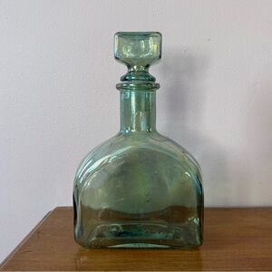 Vintage iridescent green glass decanter